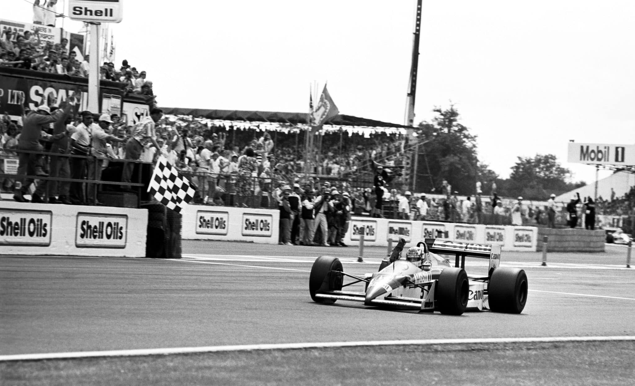Most Memorable British GPs In F1 History - Revisiting four great races at Silverstone 1 Mansell celebrates after winning a spectacular race at Silverstone