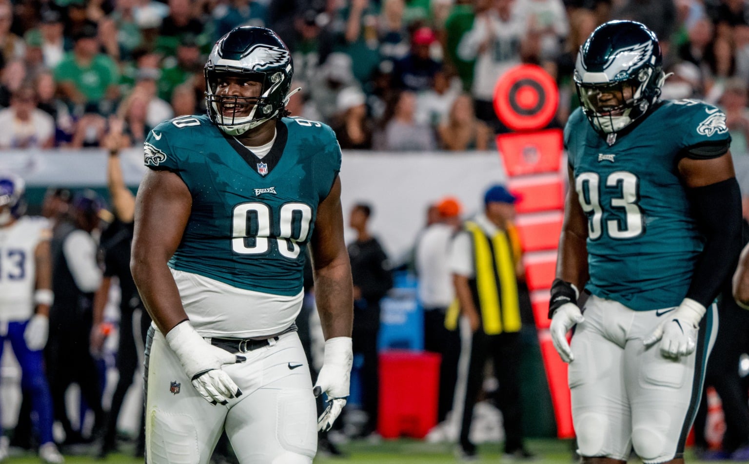 Philadelphia Eagles defensive linemen Jordan Davis and Milton Williams celebrates after a sack against the Minnesota Vikings
