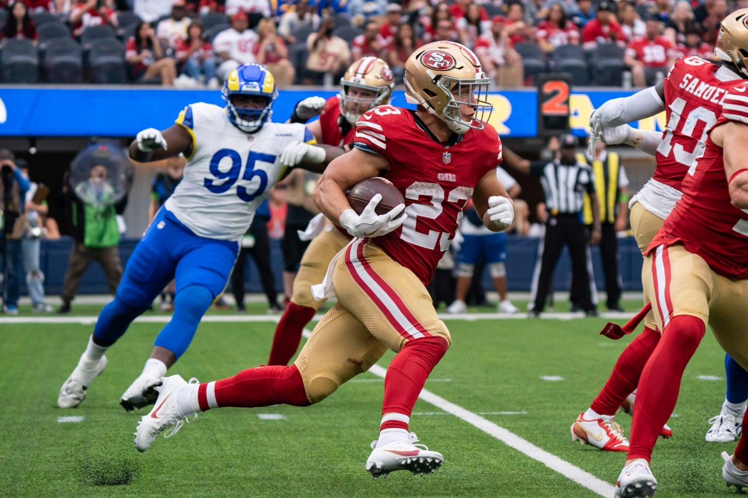 San Francisco 49ers running back Christian McCaffrey carries the ball against the Los Angeles Rams