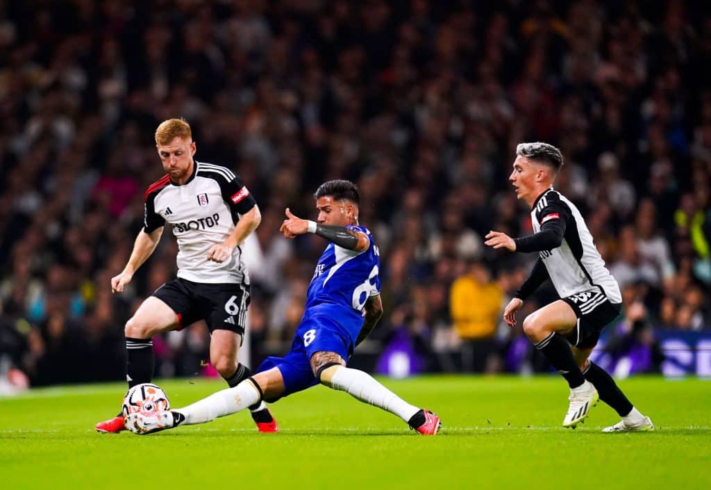 Fulham's Harrison Reed (left) and Chelsea's Enzo Fernandez